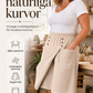 Asymmetriska wrap-shorts i knälängd för damer