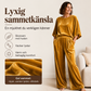 Set med halvärmad topp i sammet och byxor med vida ben för damer