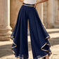 👖✨ Eleganta flödande vidbyxor med subtila gulddetaljer
