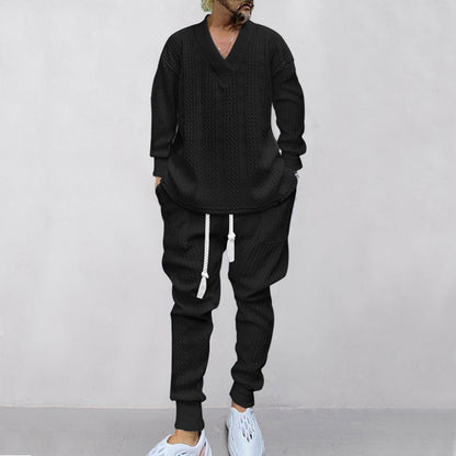 2-delat herrset bestående av en baggy sweatshirt med V-ringning och joggingbyxor