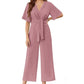Elegant V-ringad jumpsuit med vida ben och knytband i midjan för kvinnor