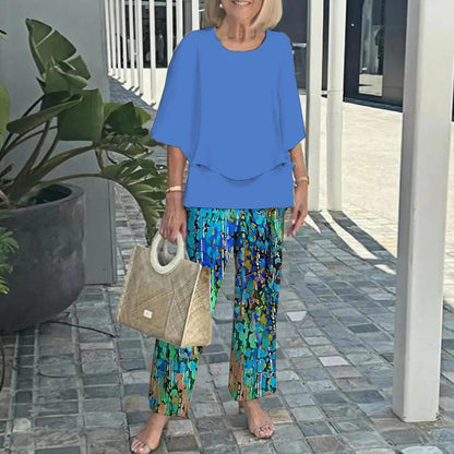 ✨Kvinnor casual rundhalsad halvärmad topp med tryck byxset