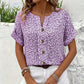 Elegant blus med blommönster för dam