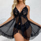 Feminint pyjamas-set med V-ringad spets och camisole