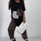 Löst sittande topp och byxor med leopardmönster