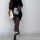 Löst sittande topp och byxor med leopardmönster