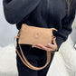 Modig zip-crossbody-väska