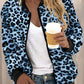 Damjacka med leopardmönster och dragkedja