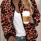Damjacka med leopardmönster och dragkedja