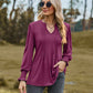 V-ringad plisserad stretch-top med smockade manschetter