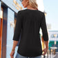 V-ringad plisserad stretch-top med smockade manschetter