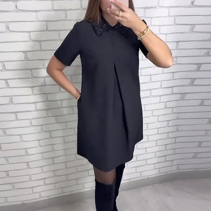 Snygg och elegant klänning med krage för kvinnor