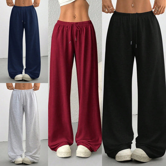 Casual sweatpants för damer med vid ben och dragsko