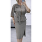Set med peplum-top med bälte och pennkjol för dam