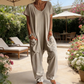 🌸 Avslappnad jumpsuit med V-ringning och djupa fickor