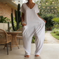 🌸 Avslappnad jumpsuit med V-ringning och djupa fickor