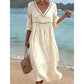 👗🌬️ Elegant avslappnad V-ringad sommarklänning med genombruten kant