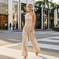 ✨ Korsad halterneck jumpsuit med elegant och luftig design