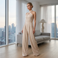 ✨ Korsad halterneck jumpsuit med elegant och luftig design