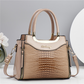 👜✨ Glansig krokodilpräglad handväska