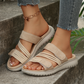 Dämpade platta sandaler med flera remmar