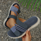 Dämpade platta sandaler med flera remmar