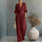 👗✨ Elegant V-ringad jumpsuit med vida ben
