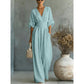 👗✨ Elegant V-ringad jumpsuit med vida ben