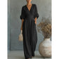 👗✨ Elegant V-ringad jumpsuit med vida ben
