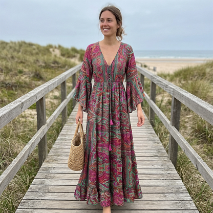 👗🌸 Bohemisk blommig maxiklänning med V-ringning och volangärmar