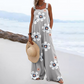 👗🌸 Blommig jumpsuit med vida ben och fickor