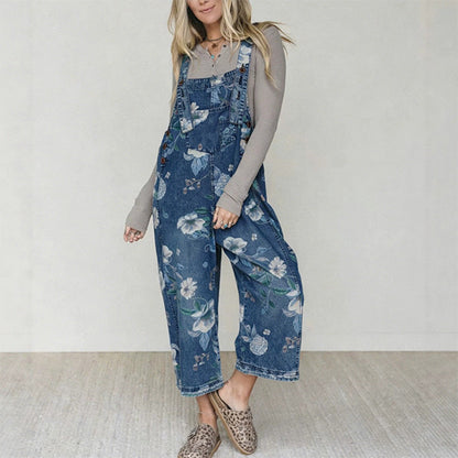 👖🌸 Denimoverall med blommönster och justerbara hängslen