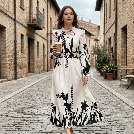 👗🌸 V-ringad blommig maxiklänning med knytband