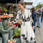👗🌸 V-ringad blommig maxiklänning med knytband