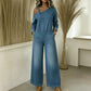 Asymmetrisk jumpsuit i denim med bar axel för damer