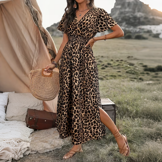 👗🌸 Elegant maxiklänning med V-hals och slits i sidan