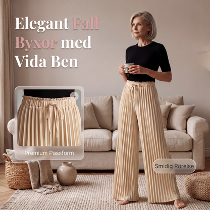 Veckade vida byxor med dragsko i midjan