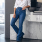 Asymmetriska jeans med hög midja och korsat ben för damer