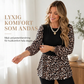Damtopp med leopardmönster och långa ärmar